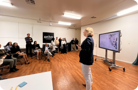 A group having a presentation in the conference room