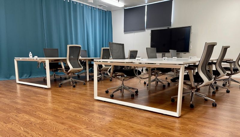 empty desk with plenty of room in coworking facility