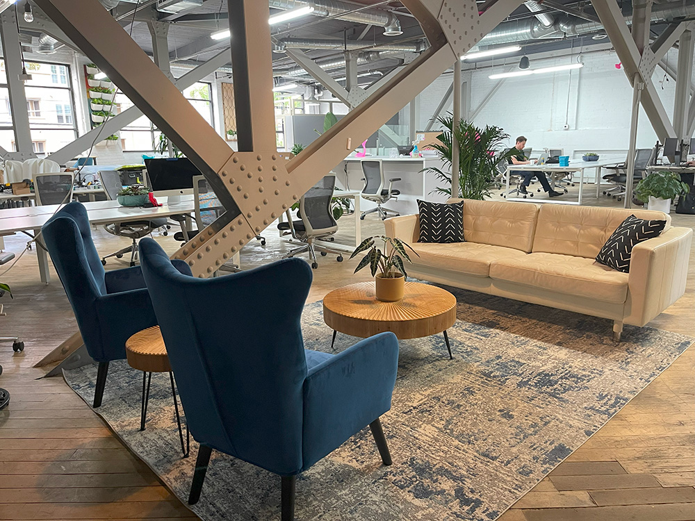 The lounge are of Cowork + Connect