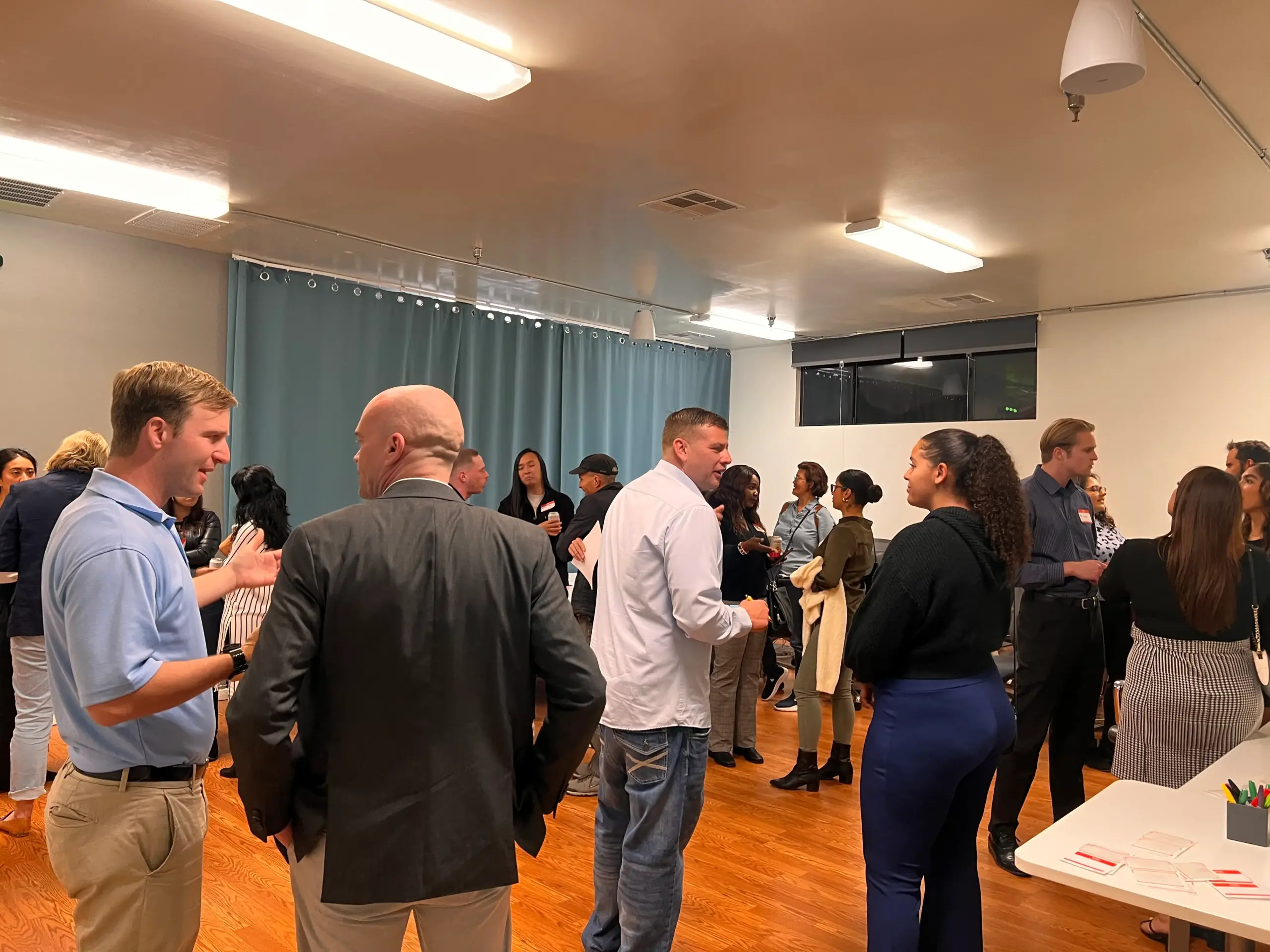 A gathering of people within Cowork + Connect