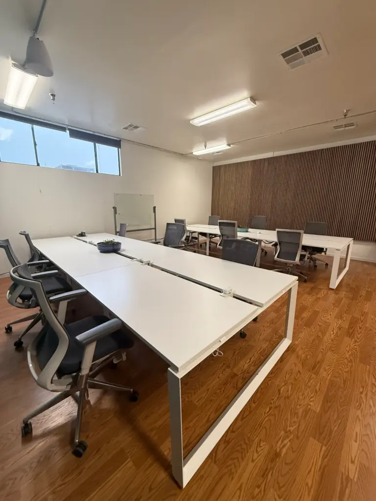 Interior shot of conference tables with in the Cowork + Connect event space